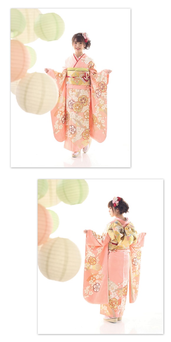 薄ピン色の振袖美人の後ろ姿と帯結び