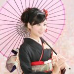 和傘を持った振袖美人
